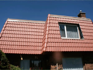 Red tile roof with dormer window