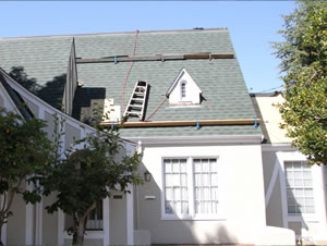 Home roof replacement in progress
